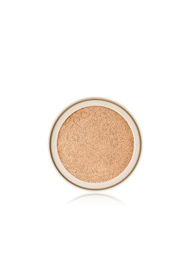 Compact powder in a round container on a white background
