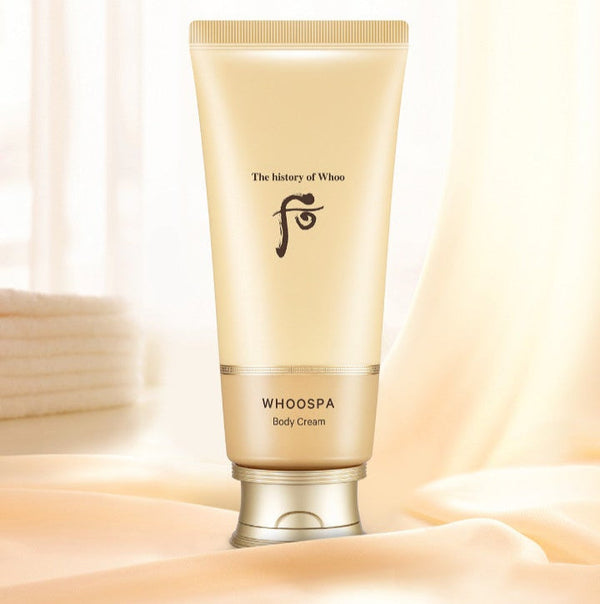WHOOSPA body cream tube with a soft beige background
