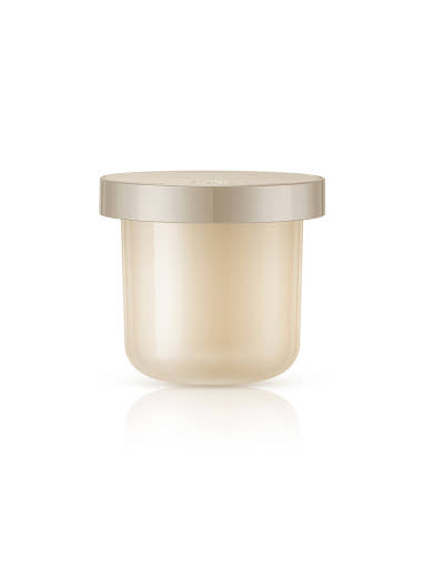 Beige container with a metallic lid on a white background